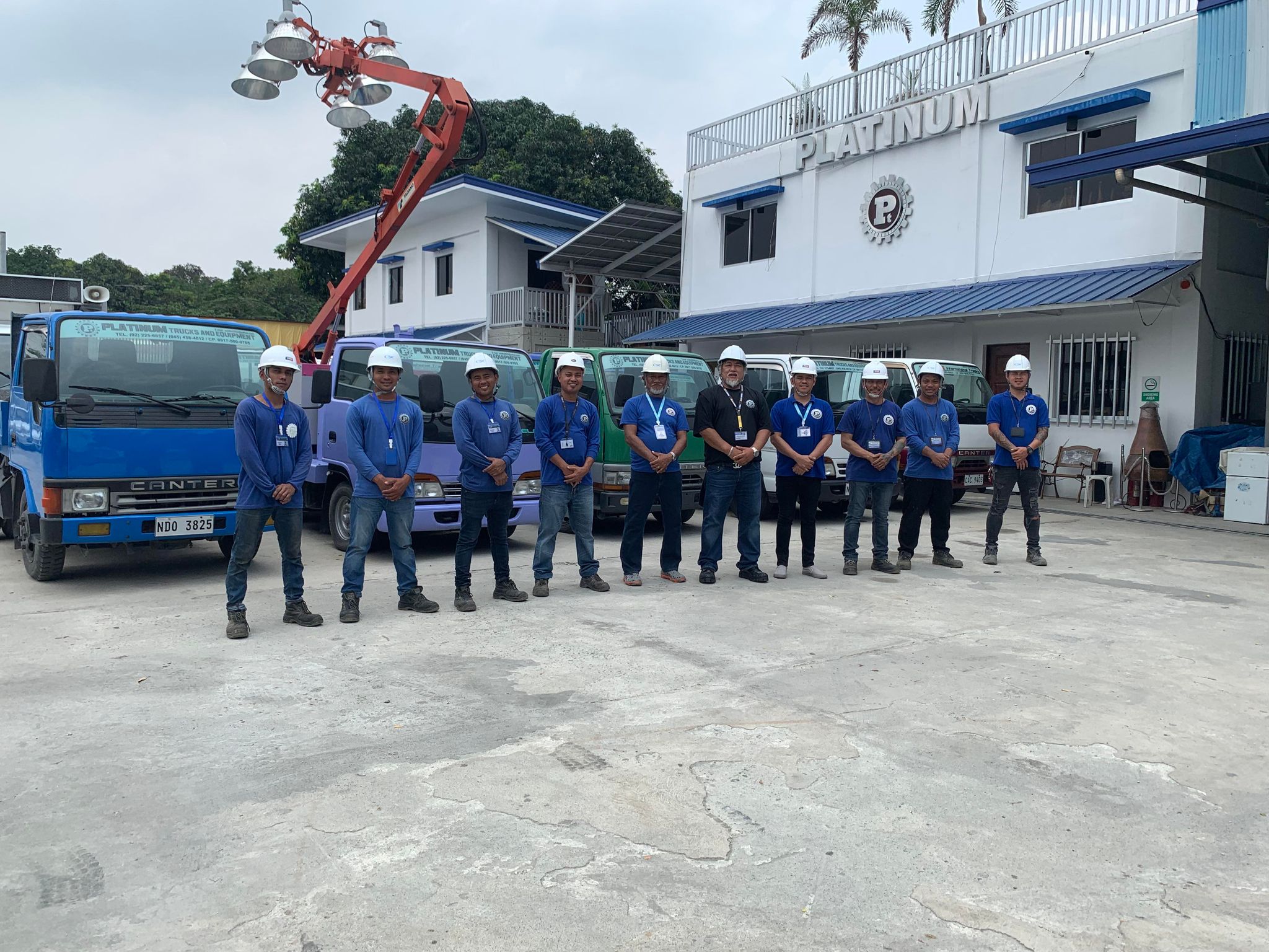 The Platinum team lined up in front of the Bacolor yard